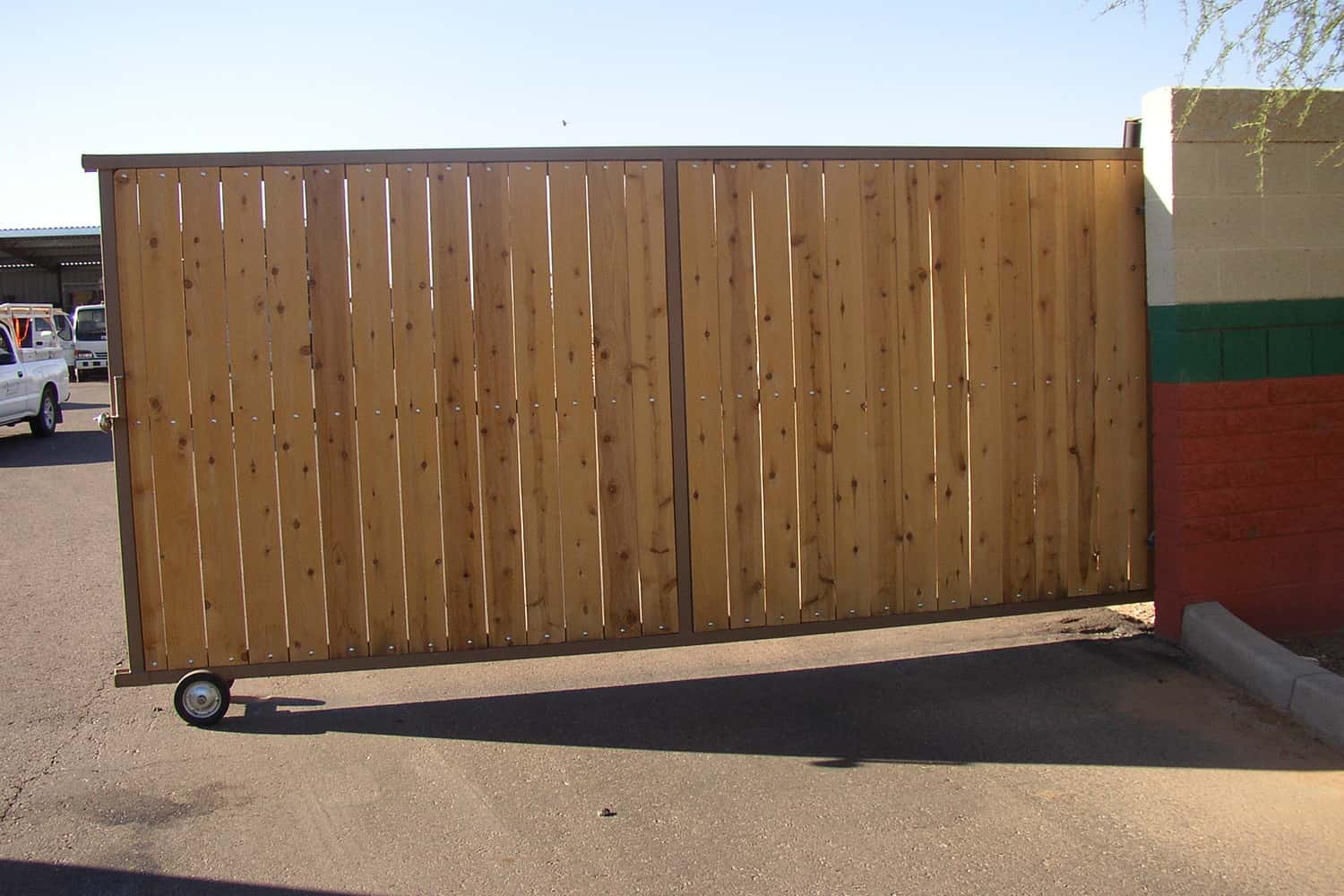 Rolling Driveway Gate with White Cedar Wood Privacy Slats